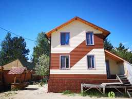 Двухэтажный каркасный дом площадью 115 м2